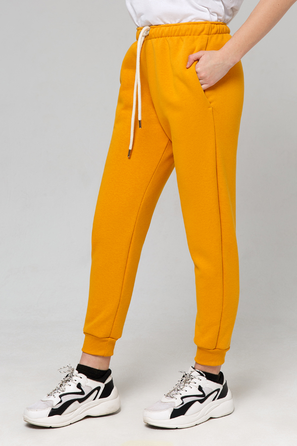 Джоггеры женские утепленные горчичный цвет купить спортивные брюки с начесомиз футера в Магазине Толстовок модель унисекс