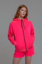 Яркое неоновое худи флюрисцентное светится в ультрафиолете розовое