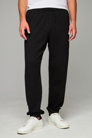 Черные мужские спортивные брюки трикотажные на лето