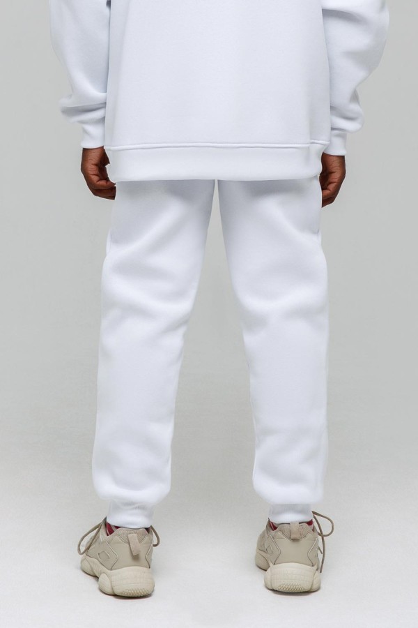 спортивные брюки белого цвета из футера трикотажные