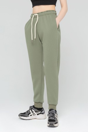 Джоггеры женские цвет фисташковый утепленные спортивные брюки с начесом